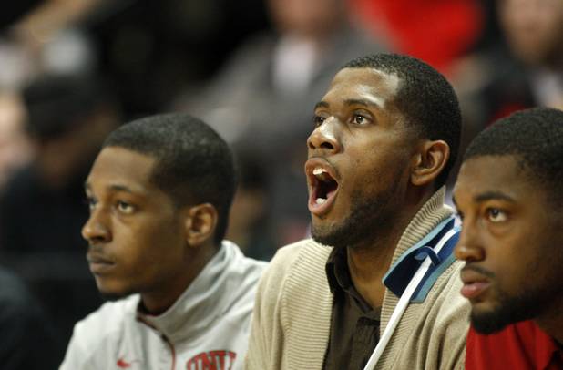 Mike Moser, recovering from injury, calls out from the bench during UNLV's game against the La Verne Leopards at the Orleans Arena Thursday, Dec. 13, 2012.