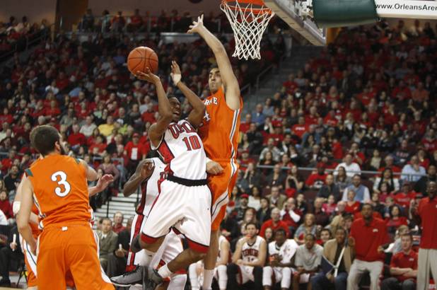 UNLV's Daquan Cook is fouled by Alex Wolpe during UNLV's game against the La Verne Leopards at the Orleans Arena Thursday, Dec. 13, 2012.