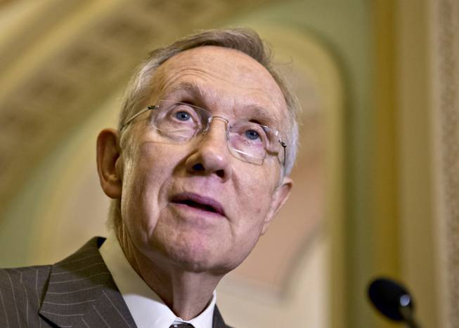 Senate Majority Leader Harry Reid, D-Nev., speaks with reporters following a Democratic strategy session at the Capitol in Washington, Tuesday, Dec. 11, 2012.  