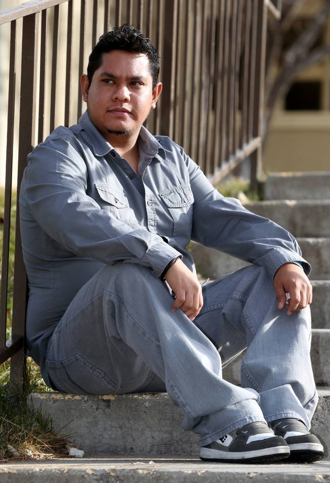 Armando Hernandez, 25, poses at his home in Reno, Nev., on Friday, Dec. 14, 2012. Hernandez, who is undocumented, is suffering from kidney failure and working to become eligible for a kidney transplant. 
