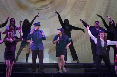 MGM Resorts International employees perform during a dress rehearsal for Inspiring Our World show at the Mandalay Bay Events Center Saturday, Dec. 15, 2012.