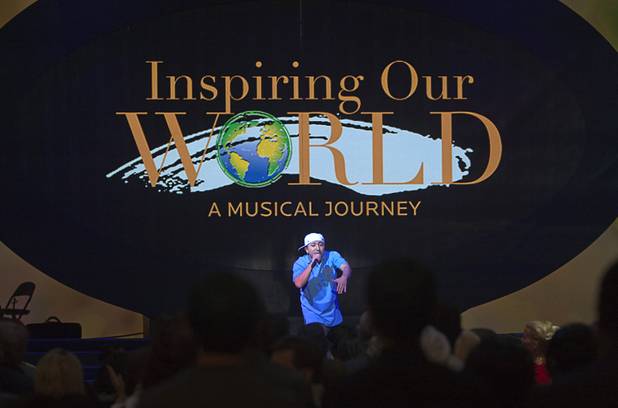 An MGM Resort International employee performs during a dress rehearsal for Inspiring Our World show at the Mandalay Bay Events Center Saturday, Dec. 15, 2012.