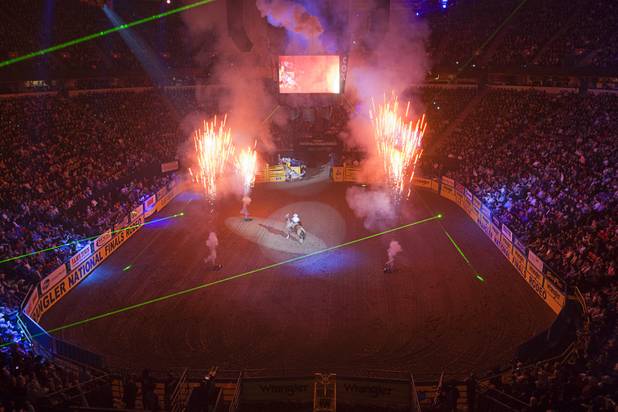 Pyrotechics explode at the opening of the final night of the Wrangler National Finals Rodeo Saturday, Dec. 15, 2012.