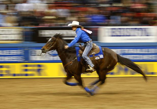 Barrel racer Mary Walker of Ennis, Texas competes during the final night of the Wrangler National Finals Rodeo Saturday, Dec. 15, 2012. Walker won the world title and the Ram Truck Top Gun Award, given to the top earner in a single event at the NFR.