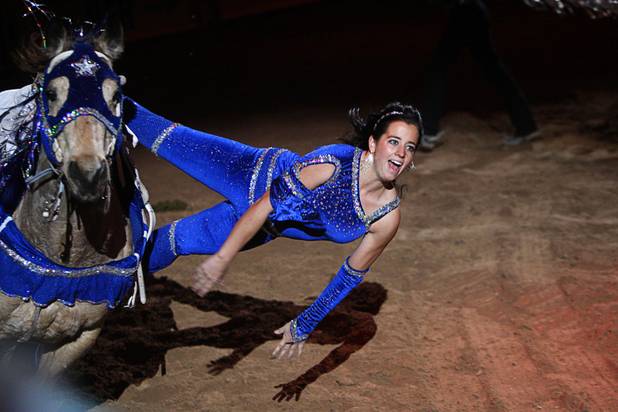 Trick rider Madison McDonald performs during the final night of the Wrangler National Finals Rodeo Saturday, Dec. 15, 2012.