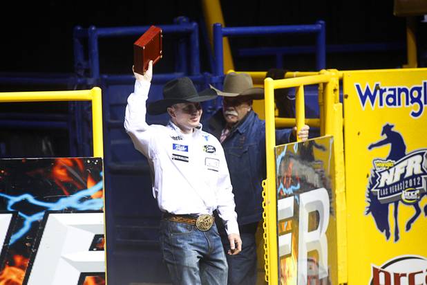 Team roper Chad Masters of Cedar Hill, Tenn. is introduced after winning the world title during the final night of the Wrangler National Finals Rodeo Saturday, Dec. 15, 2012. Team ropers split the world championship with header Chad Masters and heeler Jade Corkill of Fallon, Nev. winning championships.