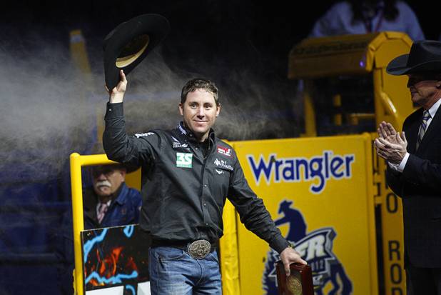 Team roper and tie-down roper Trevor Brazile of Decatur Texas is introduced during the final night of the Wrangler National Finals Rodeo Saturday, Dec. 15, 2012. Brazile set a record by winning his seventh straight all-around gold buckle.