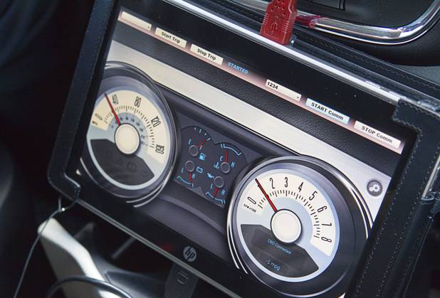 A computer tablet displays vehicle information during a demonstration of a Frias Transportation Infrastructure (FTi) system Tuesday, Dec. 18, 2012. The GPS-based system would provide useful real-time information to both regulators and consumers.