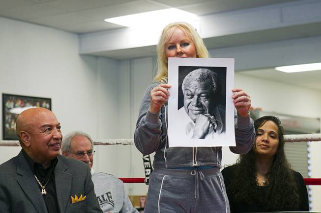 Eva Futch, widow of boxing trainer Eddie Futch, holds her ...