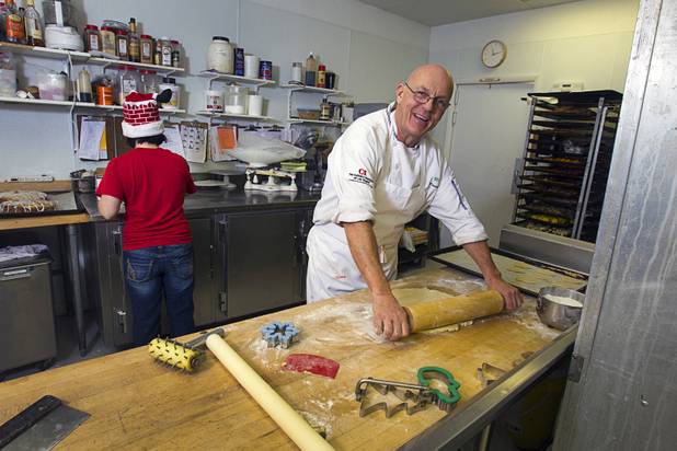 Chef Flemming Pedersen rolls out cookie dough at Chef Flemmings Bake Shop, a European-style bakery, on Water Street in downtown Henderson Thursday, Dec. 20, 2012.