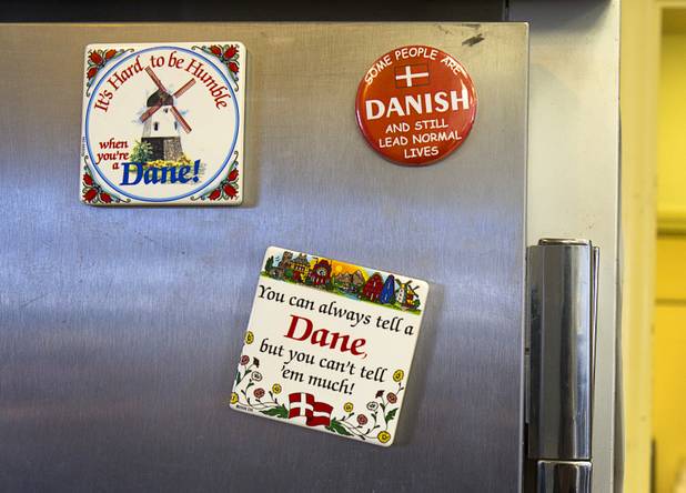 Magnets are shown on a refrigerator at Chef Flemmings Bake Shop, a European-style bakery, on Water Street in downtown Henderson Thursday, Dec. 20, 2012. Pedersen is originally from Denmark.