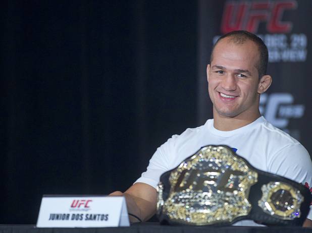 UFC heavyweight champions Junior Dos Santos of Brazil smiles during a news conference at the MGM Grand Thursday, Dec. 27, 2012. Dos Santos will defend the title against Cain Velasquez of San Jose, Calif. during UFC155 at the MGM Grand Garden Arena Saturday .