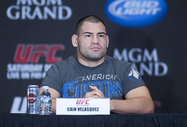 Former UFC heavyweight champion Cain Velasquez of San Jose, Calif. attends a news conference at the MGM Grand Thursday, Dec. 27, 2012. Velasquez will try and reclaim his title from heavyweight champion Junior Dos Santos of Brazil during UFC155 at the MGM Grand Garden Arena Saturday.