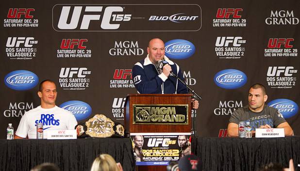UFC president Dana Whites speaks during a news conference with heavyweight champion Junior Dos Santos, left, of Brazil and Cain Velasquez of San Jose, Calif. at the MGM Grand Thursday, Dec. 27, 2012. Dos Santos will defend the title against Cain Velasquez of San Jose, Calif. during UFC155 at the MGM Grand Garden Arena Saturday .