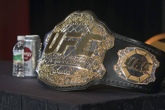 The UFC heavyweight championship belt is shown during a news conference at the MGM Grand Thursday, Dec. 27, 2012. 