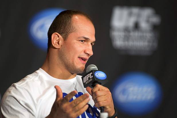 UFC heavyweight champion Junior Dos Santos of Brazil Cain Velasquez of San Jose, Calif. speaks during a news conference at the MGM Grand Thursday, Dec. 27, 2012. Dos Santos will defend the title against former champion Cain Velasquez of San Jose, Calif. during UFC155 UFC heavyweight champion Junior Dos Santos of Brazil Cain Velasquez of San Jose, Calif.