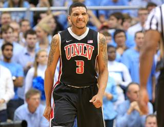UNLV guard Anthony Marshall grimaces while coming off the court during the final seconds of their 79-73 loss to North Carolina Saturday, Dec. 29, 2012 at the Dean Smith Center in Chapel Hill, N.C.