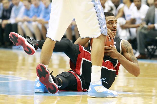 UNLV guard Anthony Marshall looks up after being fouled by North Carolina during their game Saturday, Dec. 29, 2012 at the Dean Smith Center in Chapel Hill, N.C. North Carolina won the game 79-73.