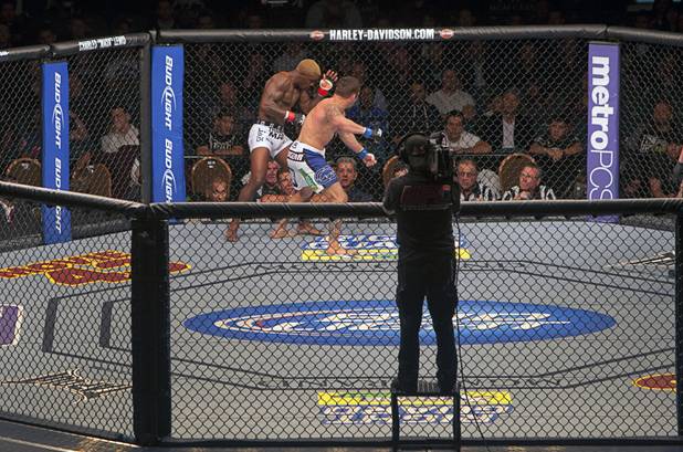 Melvin Guillard, left, of Boca Raton, Fla. fights with Jamie Varner of Dobson Shores, Ariz. in a preliminary lightweight during UFC155 at the MGM Grand Garden Arena Saturday, Dec. 29, 2012. Varner won the bout by split decision.