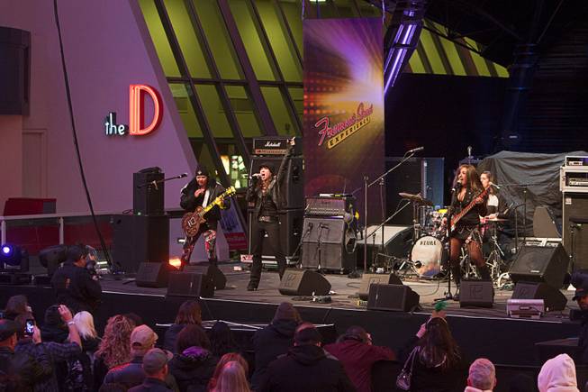 Members of the band Brazen perform during the New Years Eve party at the Fremont Street Experience Monday, Dec. 31, 2012.