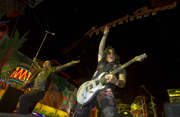 Members of Quiet Riot perform during the New Years Eve party at the Fremont Street Experience Monday, Dec. 31, 2012.