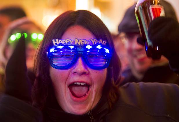 Breean Anderson of Windsor, Ontario, Canada parties during the New Years Eve party at the Fremont Street Experience Monday, Dec. 31, 2012.