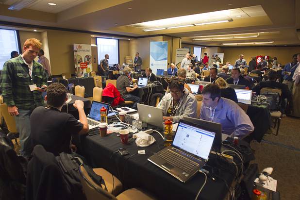 Mobile App developers work during a 26-hour innovation Hackathon at the Palms Saturday, January 5, 2013. More than 200 innovators competed for $125,000 in cash and prizes as they tried to develop the mobile apps of tomorrow. The event is a prelude to the annual AT&T Developer Summit .