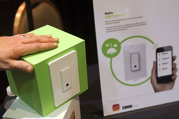 WeMo light switch by Belkin is displayed at the opening press event of the 2013 International CES at the Mandalay Bay Convention Center Sunday, January 6, 2013. The $49.00 switch, controlled wireless with a smart device, is expected to be in stores this summer.