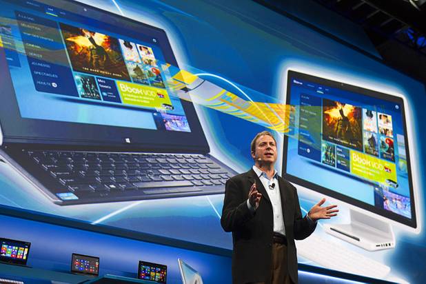 Kirk Skaugen, vice president of PC client group for Intel, talks about availability of live and on-demand pay TV content to Intel devices at an Intel press conference during the 2013 International CES in the Mandalay Bay Convention Center Monday, January 7, 2013. Intel announced improvements to its processors including one with "all day" battery life.