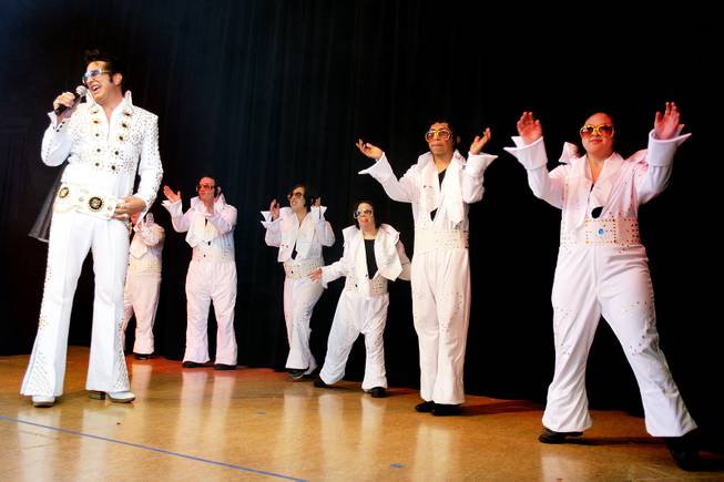 Elvis impersonator Jesse Garon performs with the OV Elvi dance troupe during a celebration of Elvis Presley's birthday at Opportunity Village Engelstad Campus in Las Vegas on Tuesday, January 8, 2013.
