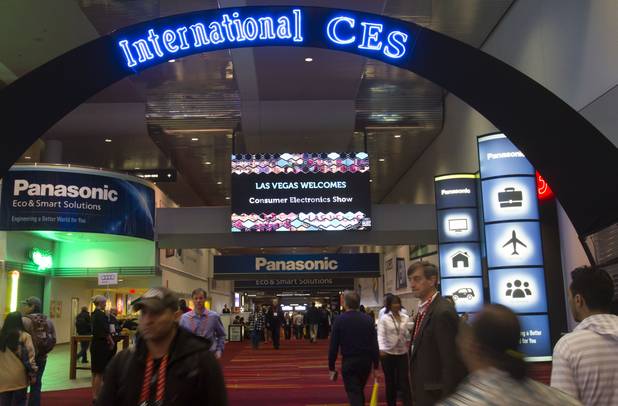 Attendees walk through the lobby of the Las Vegas Convention Center prior to the opening of the trade show floor at the 2013 International CES in the Las Vegas Convention Center Tuesday, Jan. 8, 2013. STEVE MARCUS
