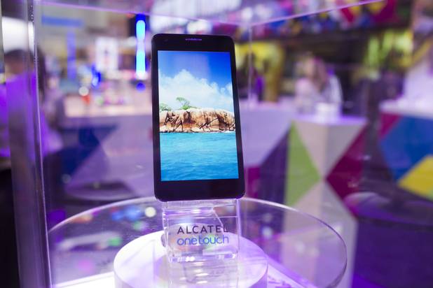 The Alcatel One Touch Idol Ultra mobile phone is displayed during the first day of the 2013 International CES in the Las Vegas Convention Center Tuesday, Jan. 8, 2013. The phone is the world's thinnest at only 6.45mm. STEVE MARCUS