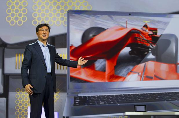 Stephen Woo, president of Device Solutions Business for Samsung Electronics, talks about the display technology during a keynote address at the 2013 International CES Wednesday January 9, 2013. Samsung introduced a new faster processor and prototype devices with flexible OLED screens.