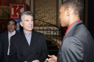 John Walsh talks with guests at the 14th annual Canon USA and NCMEC fundraiser at the Bellagio Grand Ballroom on Wednesday, Jan. 9, 2013.