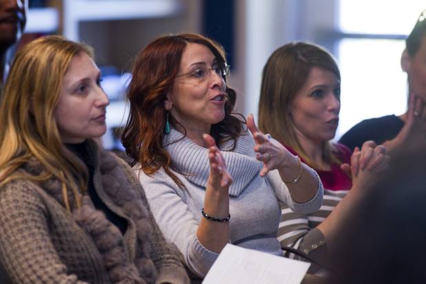 Francesca Bodner asks a question to child psychologist and author Michael Thompson during a free parenting workshop at the Adelson Educational Campus in Summerlin on Sunday, Jan. 13, 2013.