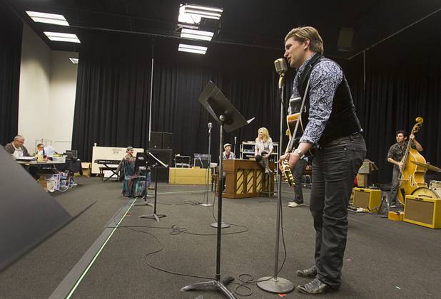 Benjamin D. Hale performs as Johnny Cash during a rehearsal for "Million Dollar Quartet" in a warehouse near The Orleans on Tuesday, Jan. 15, 2013. "Million Dollar Quartet" is based on a performance by Johnny Cash, Jerry Lee Lewis, Carl Perkins and Elvis Presley at Sun Records in Memphis on Dec. 4, 1956. The new show begins at Harrah's Las Vegas on Feb. 4.