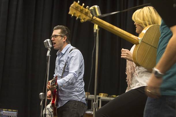 Robert Britton Lyons performs as Carl Perkins during a rehearsal for 