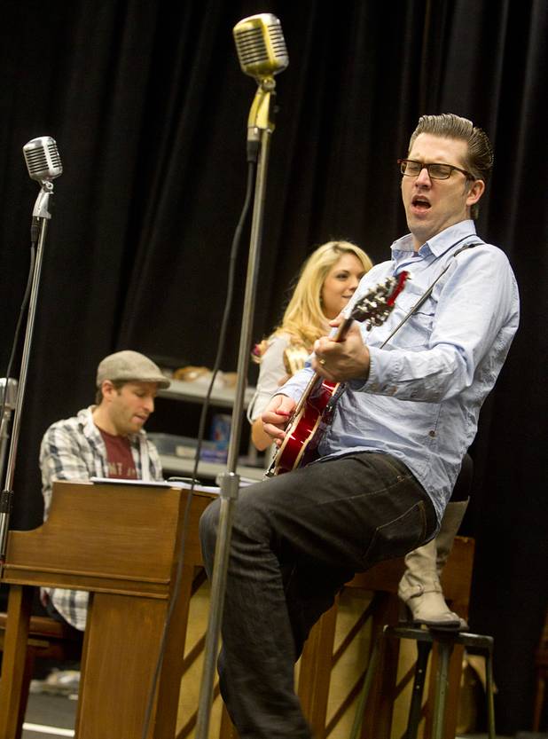 Robert Britton Lyons performs as Carl Perkins during a rehearsal for "Million Dollar Quartet" in a warehouse near The Orleans on Tuesday, Jan. 15, 2013. "Million Dollar Quartet" is based on a performance by Johnny Cash, Jerry Lee Lewis, Carl Perkins and Elvis Presley at Sun Records in Memphis on Dec. 4, 1956. The new show begins at Harrah's Las Vegas on Feb. 4.