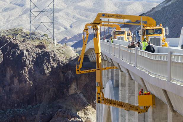 Nevada Department of Transportation workers and Stantec engineers conduct a safety inspection of the Mike O'Callaghan-Pat Tillman Memorial Bridge Wednesday, January 16, 2013.
