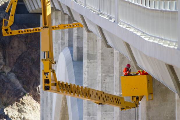 Nevada Department of Transportation workers and Stantec engineers conduct a safety inspection of the Mike O'Callaghan-Pat Tillman Memorial Bridge Wednesday, January 16, 2013.