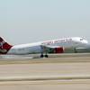 A Virgin America plane is shown arriving at Dallas Fort Worth International Airport, Dec. 1, 2010.