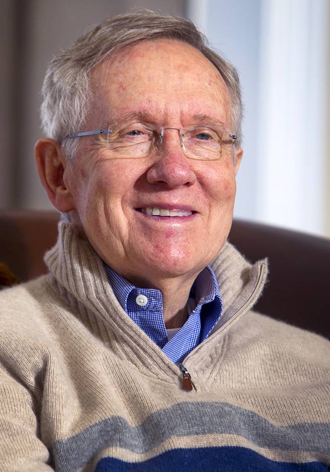 Senate Majority Leader Harry Reid, D-Nev., smiles during an interview with reporters at his home in Searchlight, Nev., on Thursday, Jan. 17, 2013.
