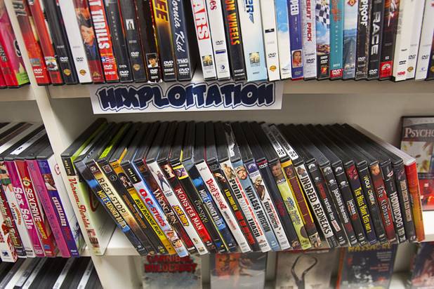 "Hixploitation" movies are displayed at Movies & Candy, 10895 S. Eastern Ave., Thursday, January 17, 2013. The category includes redneck and hillbilly-themed movies. Movie fan Trevor Layne opened the video shop last November when his house started overflowing with movies.