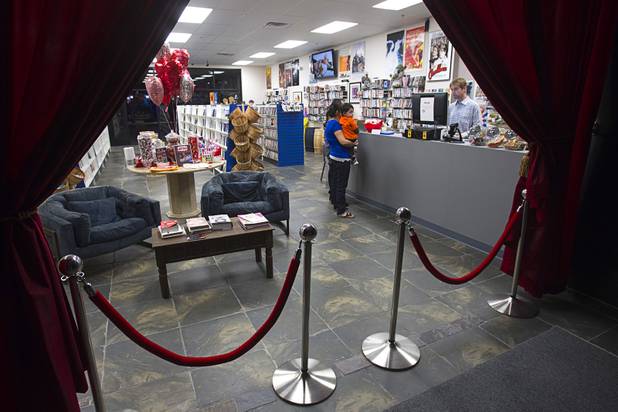 The Movies & Candy store, 10895 S. Eastern Ave., is seen from inside the shop's movie theater Thursday, January 17, 2013. Movie fan Trevor Layne opened the video shop last November when his house started overflowing with movies. The theater can be rented out for birthday parties or special events.