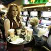 Beverage server Christa Evanko delivers drinks at the Mohegan Sun at Pocono Downs casino in Wilkes-Barre, Pa.