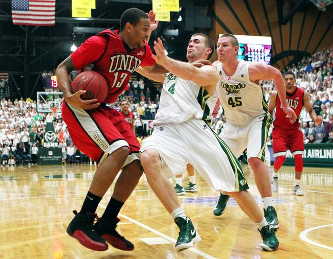 UNLV guard Bryce Dejean-Jones fouls Colorado State forward Pierce Hornung late in their game Saturday, Jan. 19, 2013 at Moby Arena in Ft. Collins, Colo. Colorado State won the game 66-61.