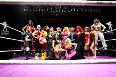 The ladies of Women of Wrestling pose for a group photo before the matches begin at the Eastside Cannery  in Las Vegas on Saturday, January 19, 2013.