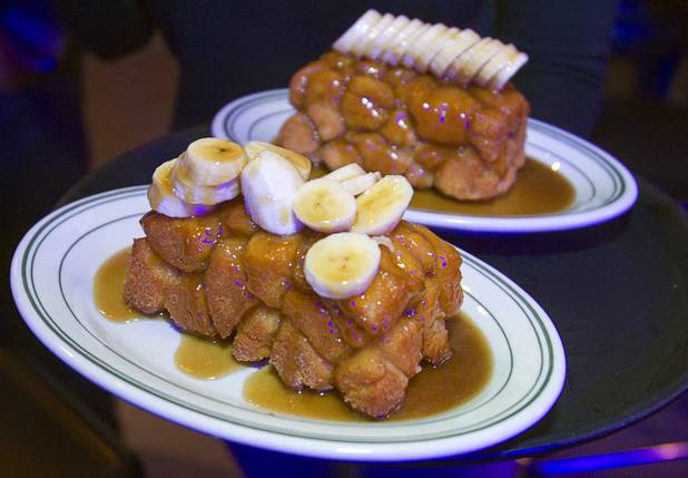Monkey Bread with caramel and bananas are served for dessert during the second annual Burning Angel porn brunch at the Rattlecan restaurant in the Venetian Sunday, Jan. 20, 2013. The brunch follows the AVN Adult Entertainment Expo which ended Saturday. About 40 guests joined adult film actresses as they downed signature "Pickleback" shots and rode a mechanical pickle, a drink concept that was inspired at the 2012 brunch.
