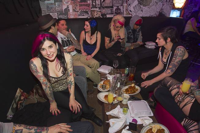 Joanna Angel, left, poses during the second annual Burning Angel porn brunch at the Rattlecan restaurant in the Venetian Sunday, Jan. 20, 2013. Angel is the creator of the Burning Angel website, an adult site specializing in alternative porn. The brunch follows the AVN Adult Entertainment Expo which ended Saturday. About 40 guests joined adult film actresses as they downed signature "Pickleback" shots and rode a mechanical pickle, a drink concept that was inspired at the 2012 brunch.