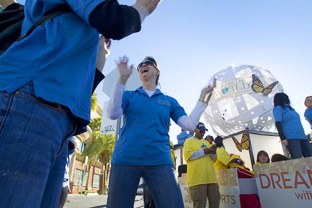 Barbara Verbenec, a casino marketing coordinator at the Mirage, rehearses a dance routine with MGM Resorts employees during the 31st annual Martin Luther King Jr. parade in downtown Las Vegas, Monday, Jan. 21, 2013. MGM Resorts International was the presenting sponsor for the event.